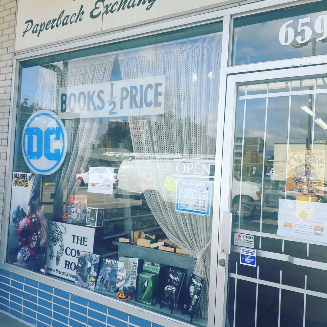 Storefront with DC and Comic Room signs